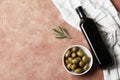 Composition of green olives and bottles of olive oil on the background. Royalty Free Stock Photo