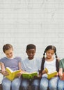 Composition of group of schoolchildren reading holding books on white squared paper in background