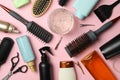 Composition hairdresser accessories on pink background, top view Royalty Free Stock Photo