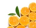 Composition with halves of fresh ripe tangerines and leaves on white background. Citrus fruit