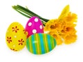 Composition of hand painted Easter eggs, flowers, daffodils. Royalty Free Stock Photo