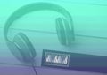 Composition of headphones and eq frequency meter on green and purple streaked background Royalty Free Stock Photo