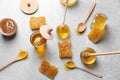 Composition with honey on grey table Royalty Free Stock Photo