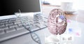 Composition of human brain and medical data processing over desk with laptop computer Royalty Free Stock Photo