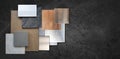 composition of interior material samples including wood veneer, ceramic tiles, multi color of aluminium metallics, travertine