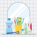 Composition of items for cleaning teeth and oral care. The concept of the bathroom with a mirror and the reflection in the mirror