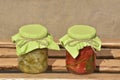 Composition with jars of pickled vegetables. Marinated food Royalty Free Stock Photo