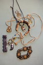 Composition of jewelry in boho style. Bracelets, pendants on the neck, earrings