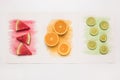 composition juicy cut fruits colored watercolor splash. High quality photo