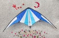Composition with kite on grey background Royalty Free Stock Photo