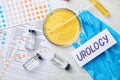 Composition with laboratory equipment and urine samples on light background. Urology concept