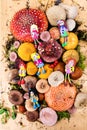 Composition with a large variety of mushrooms and dolls