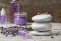 Composition with lavender flowers, spa stones Royalty Free Stock Photo