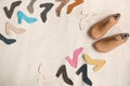 Composition with leather samples and wooden shoe-trees on light background Royalty Free Stock Photo
