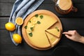 Composition with lemon tart on wooden background, top view Royalty Free Stock Photo