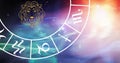 Composition of leo star sign symbol in spinning zodiac wheel over glowing stars Royalty Free Stock Photo