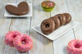 Colorful chocolate cakes on wooden table and sugar stars