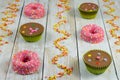 Colorful chocolate cakes on wooden table and sugar stars