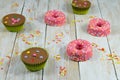 Colorful chocolate cakes on wooden table and sugar stars