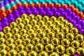 Composition from magnetic colorful metal balls - abstract background Royalty Free Stock Photo