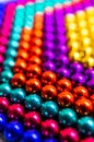 Composition from magnetic colorful metal balls - abstract background Royalty Free Stock Photo