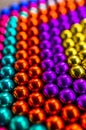 Composition from magnetic colorful metal balls - abstract background Royalty Free Stock Photo