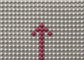 A composition from magnetic silver metal balls with the open rounded red arrow Royalty Free Stock Photo