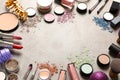 Composition with makeup products and Christmas decor on table