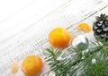 Composition with mandarins and Christmas tree on white rustic wooden background with copy space for text. Christmas mock-up or gr Royalty Free Stock Photo