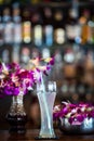 Still life with margarita cocktail and orchid flowers in the bar Royalty Free Stock Photo