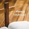 Composition of maundy thursday text over cross and holy bible Royalty Free Stock Photo