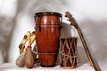 Composition of musical ethnic instrument. Maracas, tambourine, conga and ethnic drum. Percussion rhytm instruments Royalty Free Stock Photo