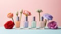 A composition with nail polish and beautiful flowers in delicate nude shades. Royalty Free Stock Photo