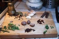 Composition of natural Herbs and spices on wooden cutting board. Royalty Free Stock Photo