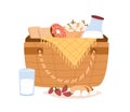 Composition of non alcoholic picnic basket with bottle of milk, sliced bread, strawberries and sweet dessert. Colorful