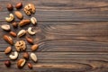 Composition of nuts , flat lay - mix hazelnuts, cashews, almonds on table background. healthy eating concepts and food Royalty Free Stock Photo