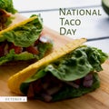 Composition of october 4 national taco day text with tacos on cutboard Royalty Free Stock Photo