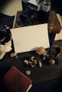Composition of old objects with white blank paper