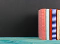 Composition with old vintage colorful hardback books, diary on w Royalty Free Stock Photo