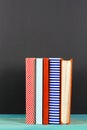 Composition with old vintage colorful hardback books, diary on w Royalty Free Stock Photo