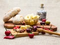 Composition with olive wood, olives, bread, cheese pieces in olive oil, spices Royalty Free Stock Photo