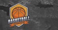 Composition of orange, white and black basketball tournament shield design, on concrete texture