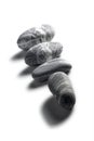 Composition of pebbles on a white background Royalty Free Stock Photo