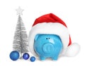 Composition with piggy bank and Christmas decor