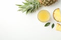 Composition with pineapple, slices and glass of juice on white background Royalty Free Stock Photo