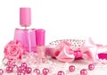 Composition of pink: perfume, a comb, ribbon