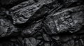 Abstract background featuring a black wall composed of coal