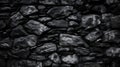 Abstract background featuring a black wall composed of coal