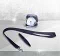 Composition of promo products Black Lanyard Neck Strap with Metal Lobster Clip and black pen, silver table office clock.