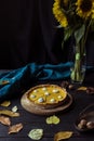 Pumpkin pie and decorative sunflowers